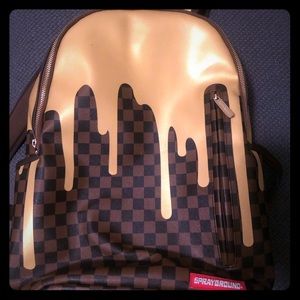 Sprayground Gold Checker Drips Backpack